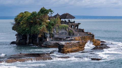 The sea temple of Tanah Lot on its rock at sunset, Bali