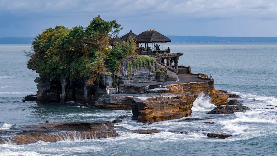 The sea temple of Tanah Lot on its rock at sunset, Bali